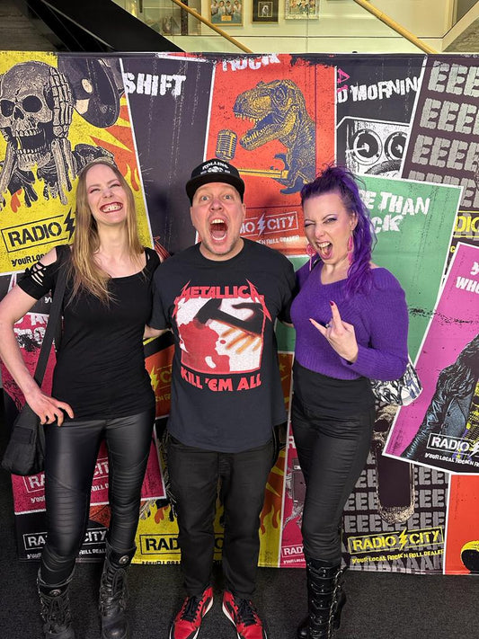 Two women with radio host Mikko Honkanen